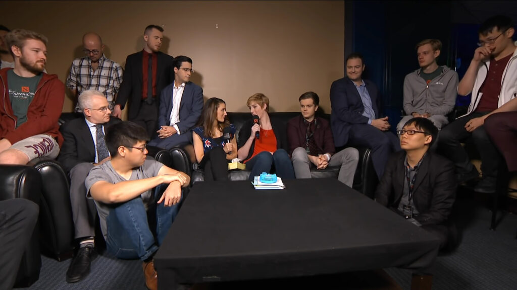Sheever surrounded by Dota 2 talent in a live segment after Valve's documentary in 2018 (Image via Gucci)