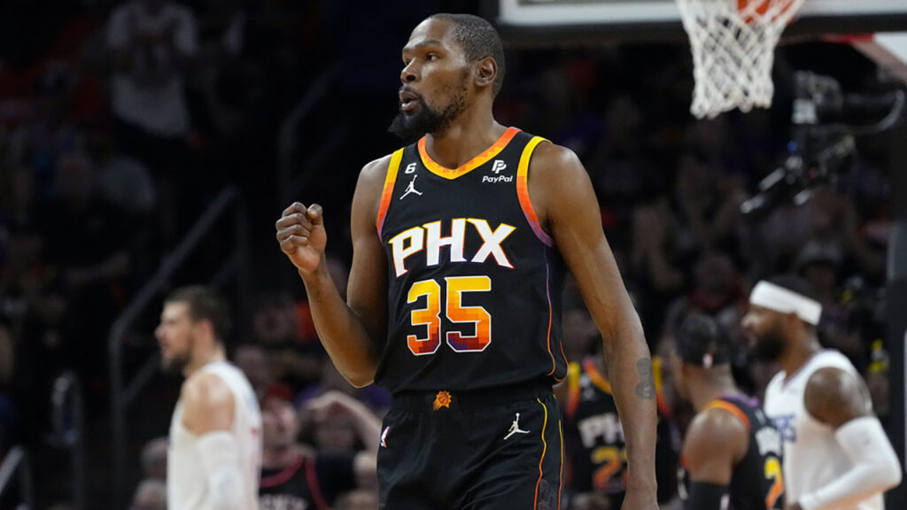 Phoenix Suns forward Kevin Durant (35) celebrates a basket against the Los Angeles Clippers during Game 5 of a first-round NBA basketball playoff series, Tuesday, April 25, 2023, in Phoenix. (AP Photo/Matt York)