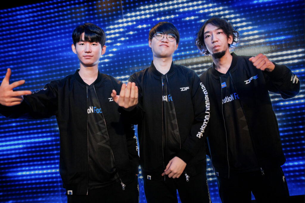 DFM's mid, jungle and top lane at Worlds 2023 - image via Colin Young-Wolff/Riot Games