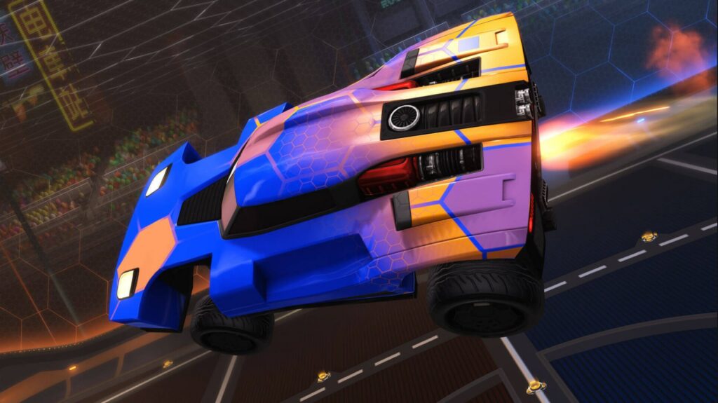 Rocket League car leaping through the arena. Image Credit: Epic Games