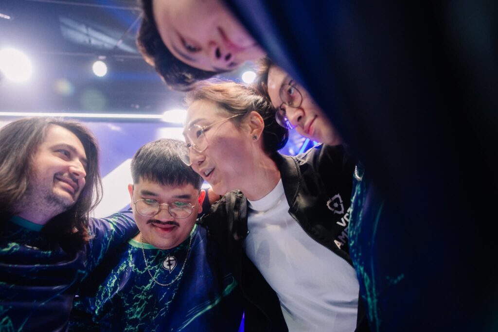 Evil Geniuses huddles, led by coach Potter, onstage before competing at VCT Americas Kickoff on Day 2 of Week 2 at Riot Games Arena on February 24, 2024. 