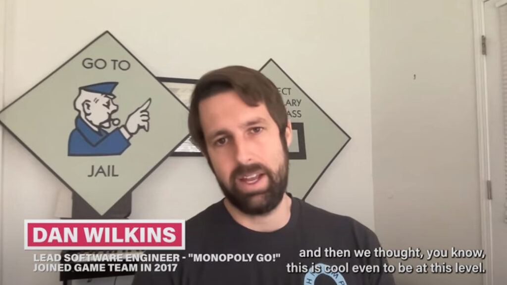 <em>Dan Wilkins speaking about the development of Monopoly Go (Image via Scopely on YouTube)</em>