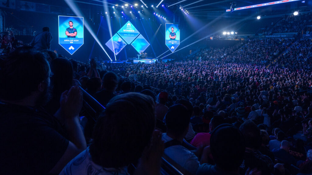 A photograph of the Evo 2023 crowd at the Mandalay Bay Convention Center in Las Vegas.