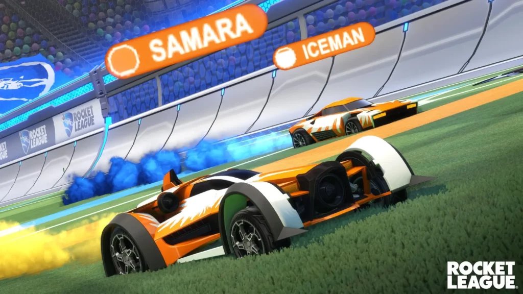 Shows two cars, a Paladin and a Breakout, showcasing the boost indicators on nameplates being added in this Rocket League update.