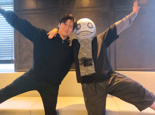 The two directors posing together (Image via IGN Japan)