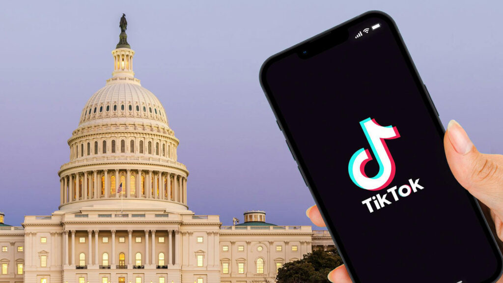 Supplementary image for TikTok sues the US government. Shows TikTok loaded up on a smartphone (right) in front of the US capitol building (left).