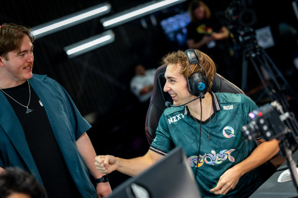 FLY Busio on stage with coach Damonte (Image via Riot Games)