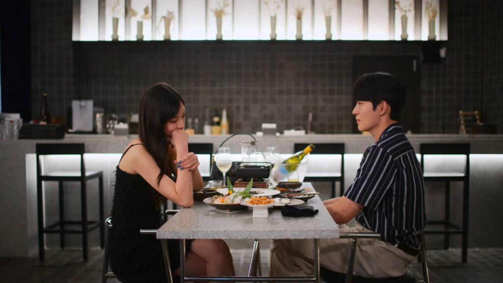 Park Hae-lin and Kook Dong-ho during their dinner (image via Netflix)