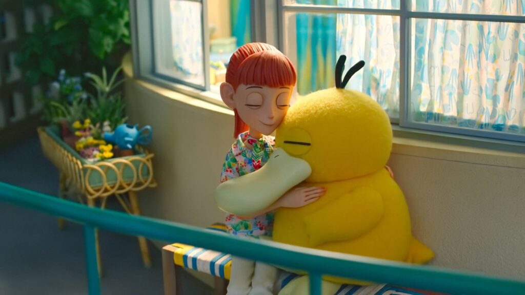 Haru becomes closer with the Pokemon in the resort, especially Psyduck (Image via The Official Pokémon YouTube channel)