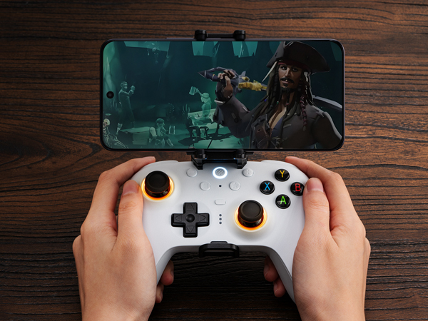 The controller paired with a phone (Image via 8BitDo)