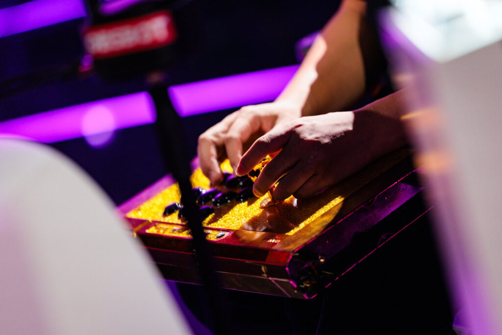Xiao Hai's golden controller of an EVO Champion (Photo via Esports World Cup | Adela Sznajder)
